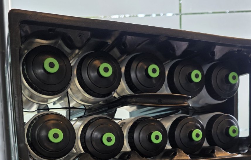 Top view of the actual crate with two rows of five bottles and a central carrying handle
